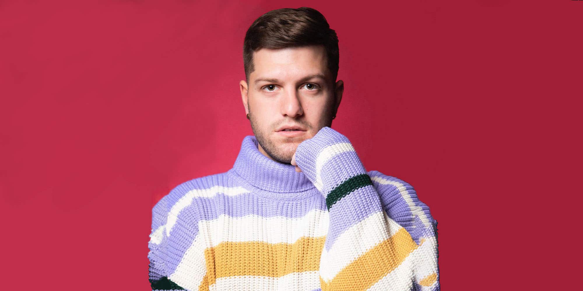 Zachariah Porter in a striped sweater.